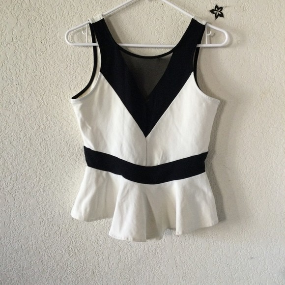 bebe Tops - Bebe peplum blouse